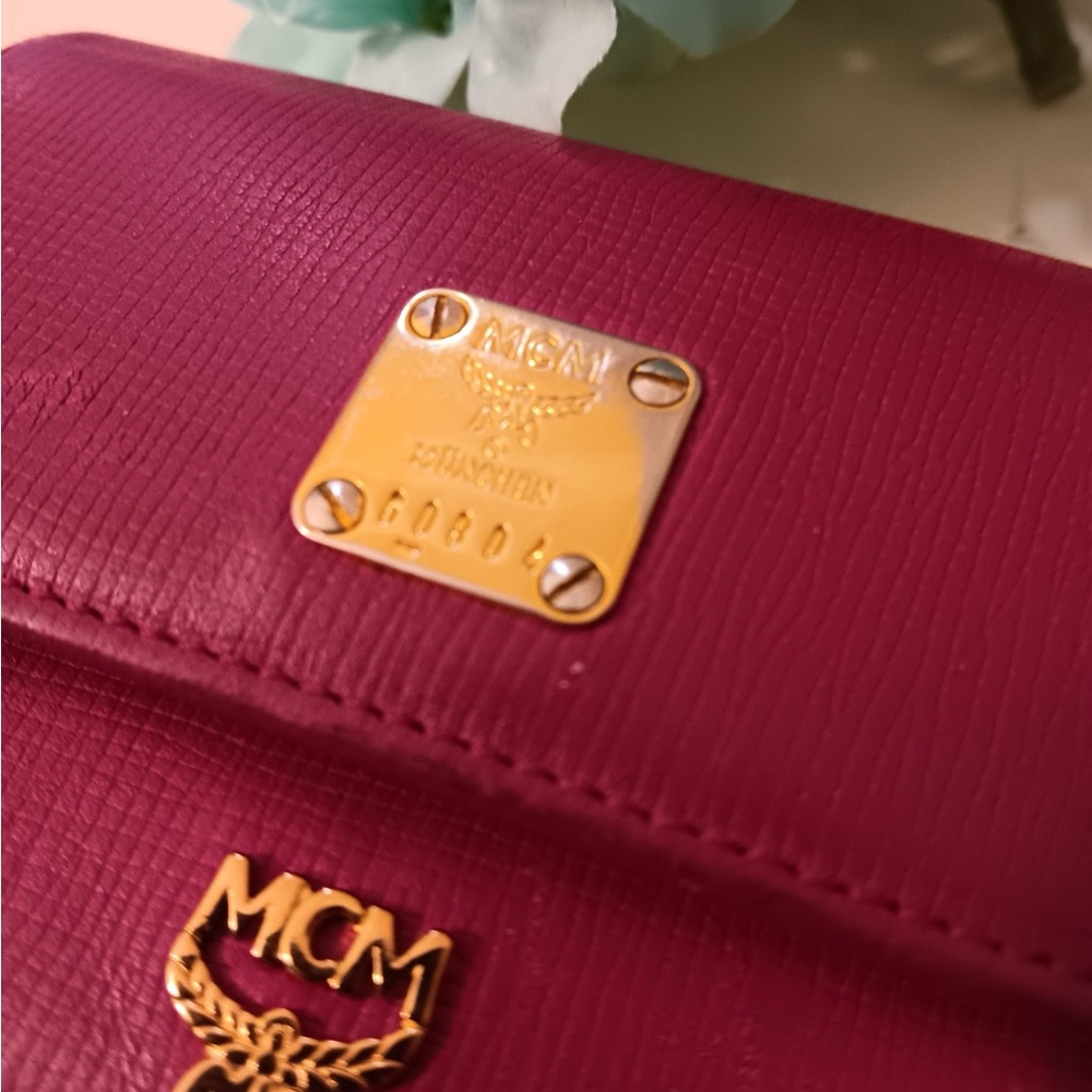 MCM trifold wallet with gold hardware and MCM AUTHENTIC charm - Picture 4 of 8